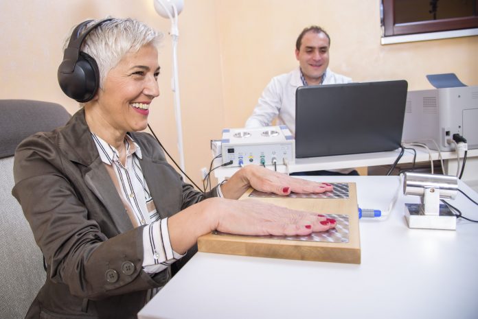Older woman using alternative medicine