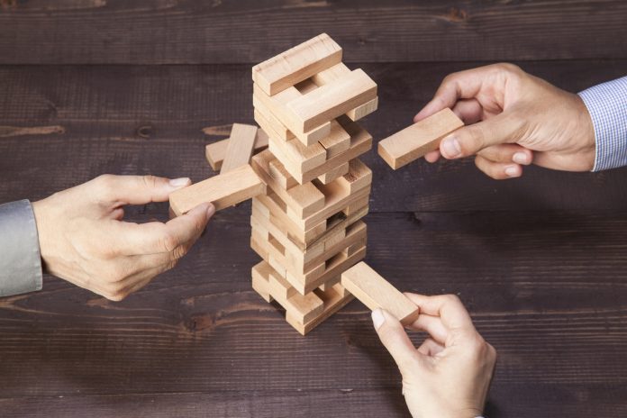 Businessmen Builds a Tower