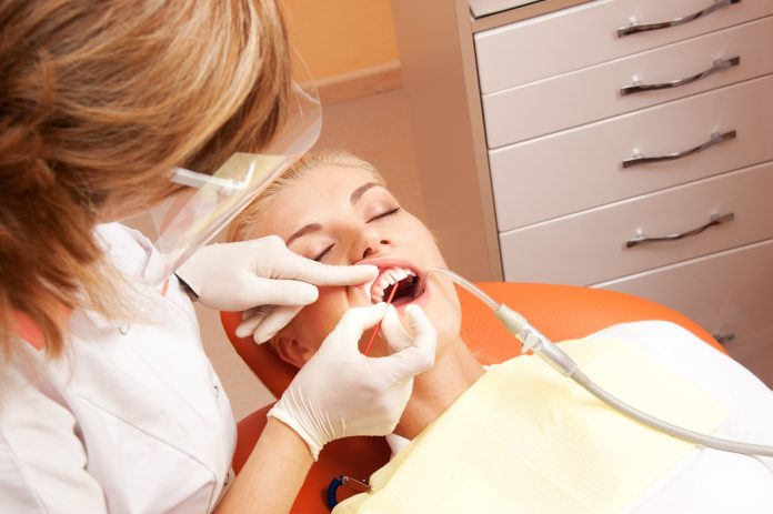 Woman at the dentist's surgery.