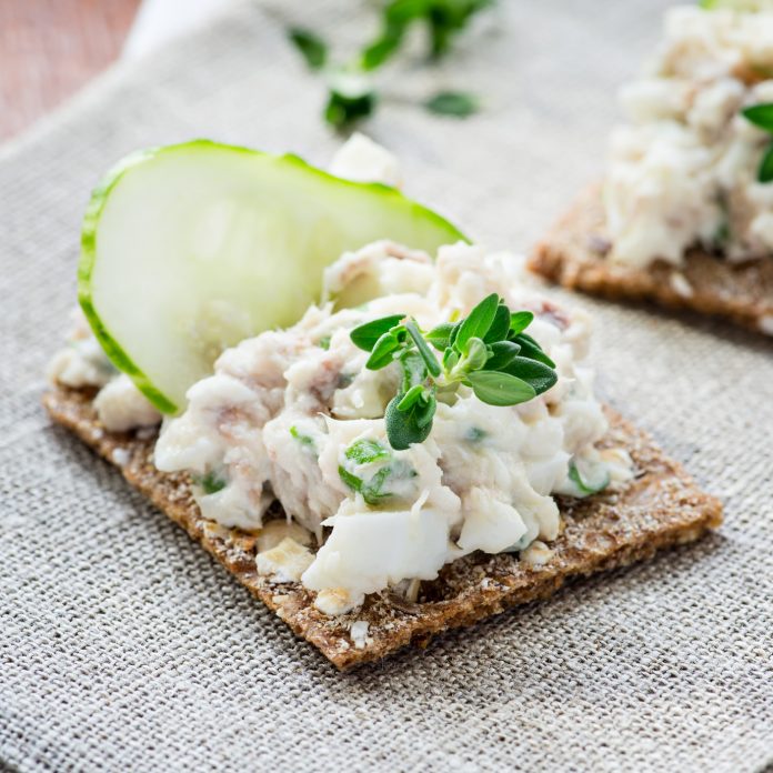 Smoked mackerel pate with herbs on crisp bread