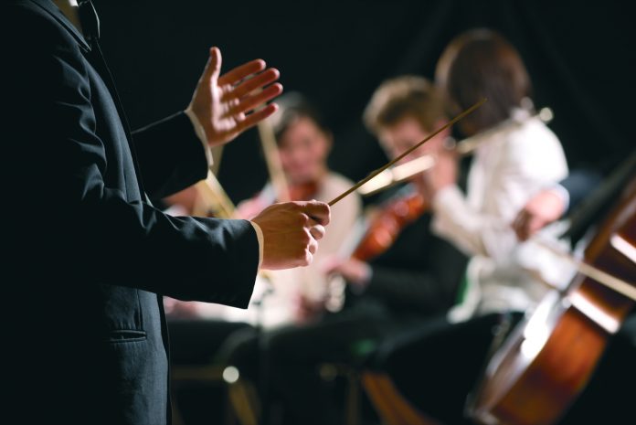 Orchestra conductor on stage