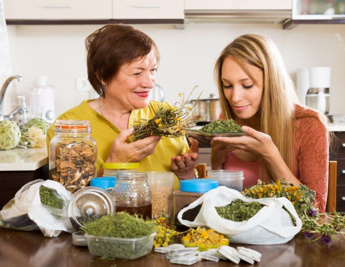 Womans with medicinal herbs