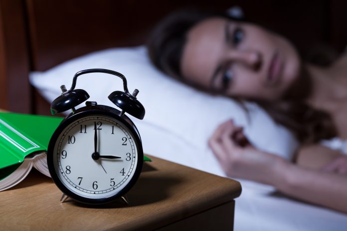 Alarm clock showing 3 a.m.