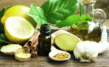 Alternative Medicine with Garlic, Ginger and Lemon Oil