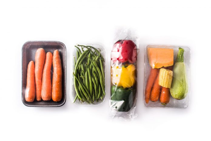 Different types vegetables packaged isolated on white background