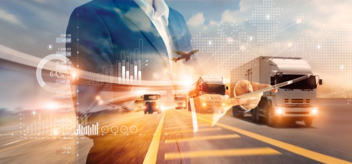 Double exposure of businessman and graph growth of business with world map of transportation and logistics network distribution and trucks of industrial cargo freight for shipping. import-export.
